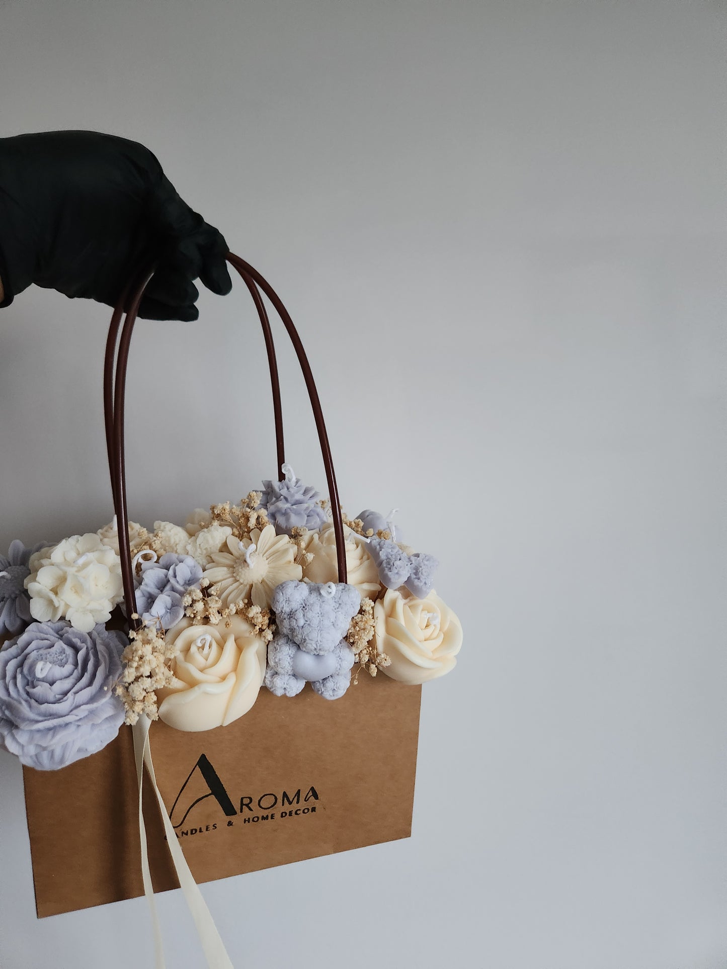 Sac de bougies en arrangement floral